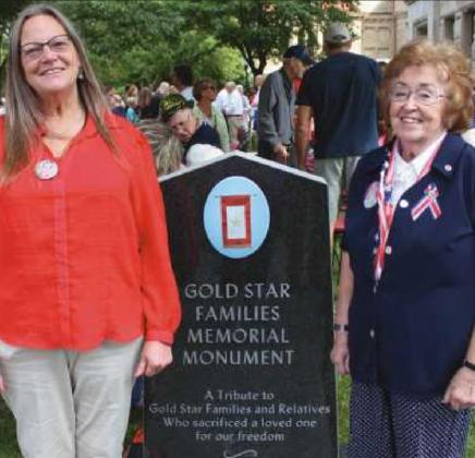 Darlene Dunlap, left, and Sharon Belkofer, visit the Gold Star Families memorial.