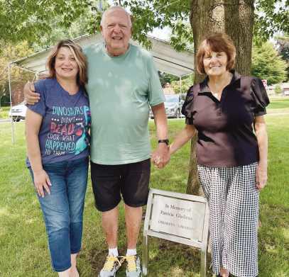 From left: Library Director Goldsmith, Patricia Gladieux’s son, Bill Gladieux, and Bill’s wife, Cindy Gladieux.