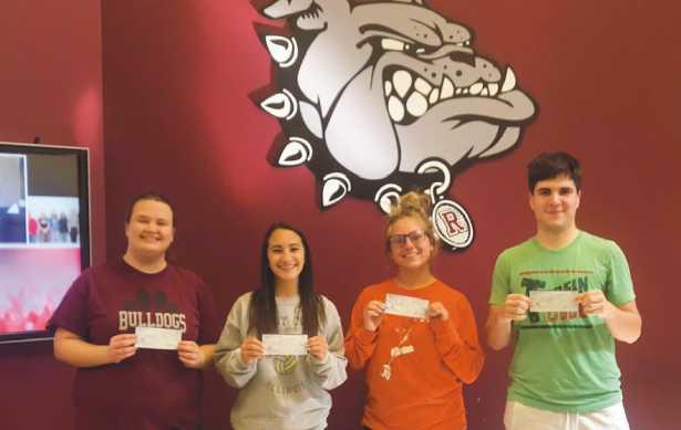 Award winners pictured from left, Grace Eckel, Allison Misko, Maci Bihn and Jonah Shafer with their scholarship checks.