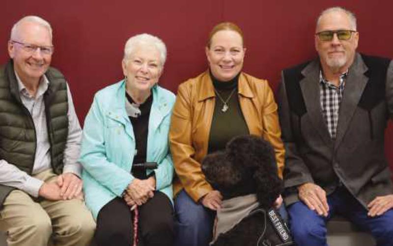 From left: Officer Johnson’s parents, Wayne and Becky Johnson; Officer Jodi Johnson; and her boyfriend, Chris Krall.