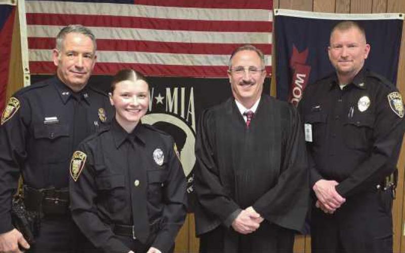 From left: Deputy Police Chief Jason Gladney, newly hired Patrol Officer Hannah Palacio, Perrysburg Municipal Court Judge Aram Matthew Ohanian and Police Chief Matt Gazarek.