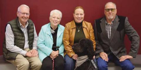 From left: Officer Johnson’s parents, Wayne and Becky Johnson; Officer Jodi Johnson; and her boyfriend, Chris Krall.