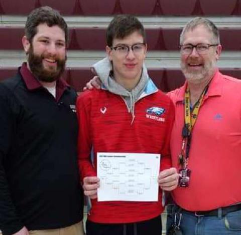 Keeping a family wrestling tradition alive, Jimmy Recknagel of Eastwood, center, placed first in the 170 lbs. weight class. He is pictured with DJ Recknagel, left, who was an NLL champ in 2009, 2010 and 2011 and Ron Recknagel, who was NLL champ in 1984 and 1985.
