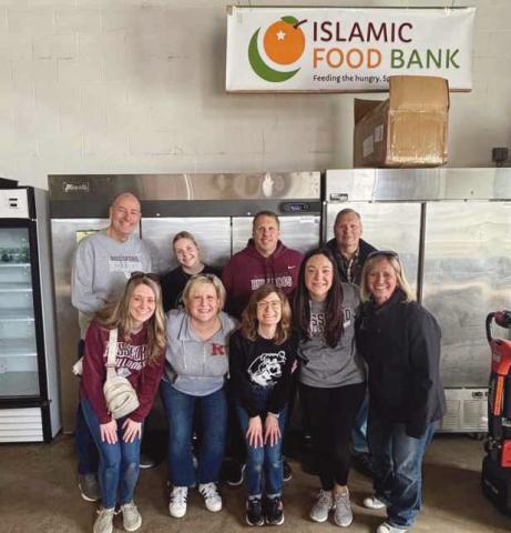 From left, top row: Superintendent Dan Creps, Megan Skrzyniecki, Assistant Principal Bryan Skrzyniecki and Randal Skrzyniecki. Bottom row: Teachers Caitlyn Schwiefert and Julie Skrzyniecki, Media Specialist and Librarian Brittany Fenderson, Counselor Kellie Kelley and Director of Student Services Erin Perry.
