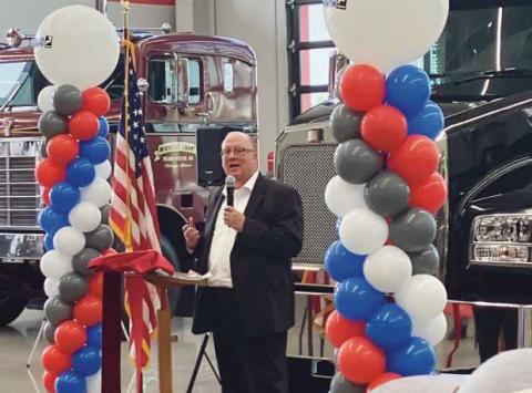 Mayor Neil MacKinnon III spoke during the Whiteford Kenworth ribbon cutting.