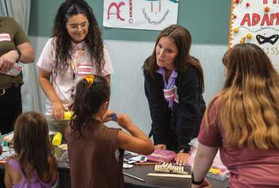 Owens Occupational Therapy Assistant student Jessie Materni works with Girl Scouts during the summer workshop. Photo provided by Owens Community College.
