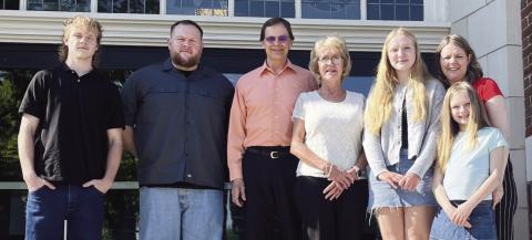 From left: Brock Queen (brother), Timothy Queen (father), Henry and Andrea Werner, Grace Queen, Abigail Queen (mother) and Eva Queen (sister)