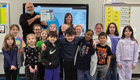 Rossford Elementary second grade teacher Beth Cramer was presented a $500 WATER grant.