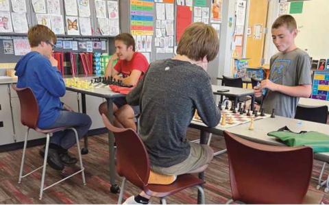 From left, players with faces showing: Nathan Minor and Draven Scott. Players with backs showing: Gabriel Kelsey and Zeke Murtha.