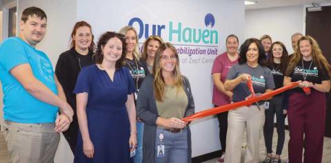 Crisis Team at ribbon cutting with Zepf Center CEO.