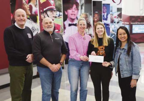 From left: Superintendent Dan Creps, foundation Vice President Doug Miller, teachers Ann Trondson and Kelly Burnett and foundation President Mary Shinavar.