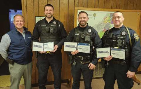 From left, Daniel Deiter of Modern Woodmen of America, presented Hometown Hero awards to Ptl. Kurt Schroeder, Ptl. Clayton Ringle and Ptl. Nicholas Owens.