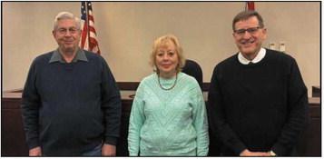Oath of office administered on February 6 at Wood County Juvenile Court (from left): CRB volunteers Steve Heckler and Ann Hannah-Cizauskas with Judge David Woessner.