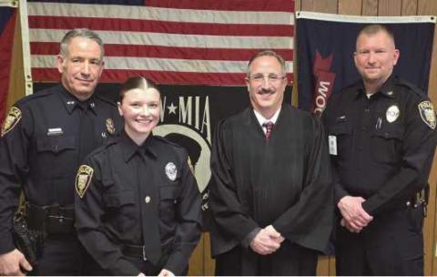 From left: Deputy Police Chief Jason Gladney, newly hired Patrol Officer Hannah Palacio, Perrysburg Municipal Court Judge Aram Matthew Ohanian and Police Chief Matt Gazarek.