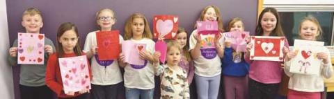 Children, families make Valentine’s Day cards