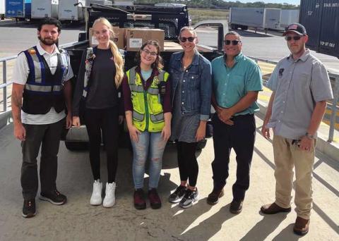 Amazon Rossford recently made a donation to Rossford Schools of hygiene and household items, school supplies and non-perishables—items that will directly support students and families in need. From left: Cody Igo (a Rossford graduate and member of the Bulldog Foundation), Brooke Moenter and Lexie Schraer, all from Amazon, and Regan Findling, Neal Applin and James Phillips of Rossford Schools.