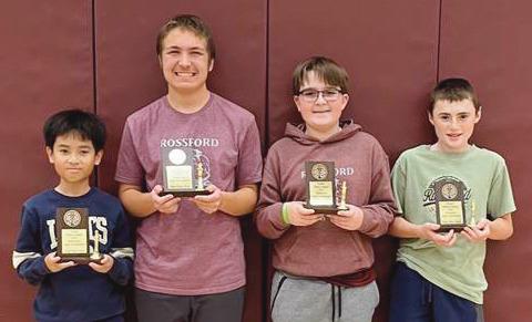 Junior high players with their 3rd place plaques, from left: Bao Nam Dang, Nathan Minor, Nolan Vascik and Draven Scott.