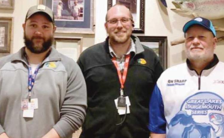 Ron Sharp, far right, is the 2022 Rossford Walleye Roundup Tournament director. He is pictured with Josh Noel and Bill Sisty of Bass Pro Shops.