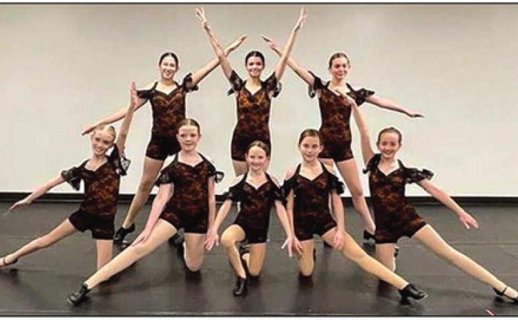 Perrysburg Dance Academy dancers preparing for their tap roles as Hot Chocolate dancers. Pictured top row, Makenzie Burnham, Adrianna Garcia (graduating senior), Genevieve Stierman; bottom row, Jaclyn Kantner, Molly Hayes, Johanna Czech, Stella Rygalski and Madilyn Maher.