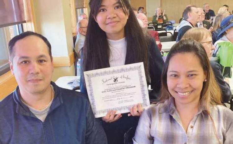 Rossford High School freshman, Amanda Bautista, placed second in the Eagles Zone Conference, God, Flag and Country oratory contest in Celina, Ohio, on April 13. She previously placed first at the Rossford Aerie 2322 with her speech regarding the flag. Pictured above is Amanda, accompanied by her parents. Contact Debbie Zuchowski at 419-442-1453, with questions or to discuss interest in entering next year’s competition.