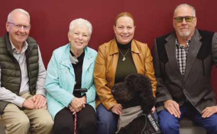 From left: Officer Johnson’s parents, Wayne and Becky Johnson; Officer Jodi Johnson; and her boyfriend, Chris Krall.