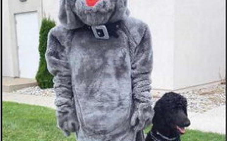 To celebrate National Dog Day August 26, the Bulldog mascot and Oggy, the Rossford High School therapy dog, visited a medical rehabilitation center with School Resource Officer Jodi Johnson to cheer up those recovering from injuries.