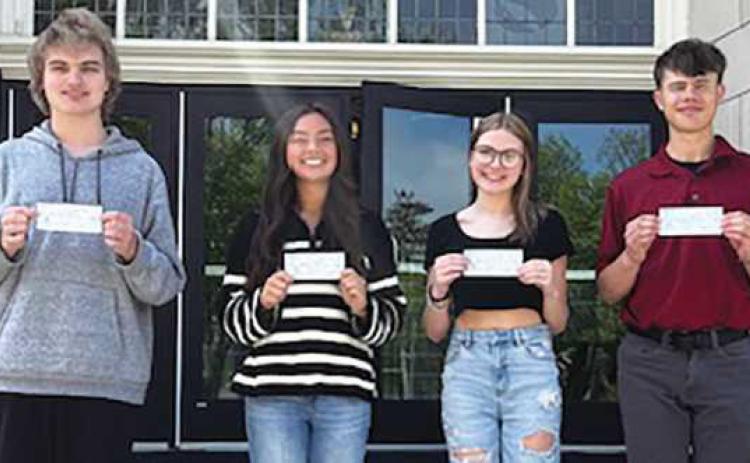 Rowen Lanning, Sophia Shinavar, Karlee Hill and Owen Swonger are the 2025 Rossford Business Association senior scholarship winners.