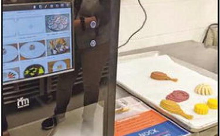 This Foodini is a user-friendly, 3D printing kitchen appliance that can be used for icing cakes or biscuits.