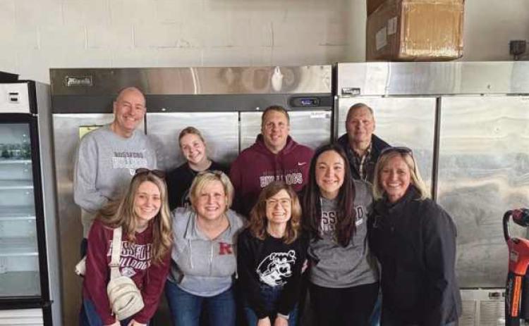 From left, top row: Superintendent Dan Creps, Megan Skrzyniecki, Assistant Principal Bryan Skrzyniecki and Randal Skrzyniecki. Bottom row: Teachers Caitlyn Schwiefert and Julie Skrzyniecki, Media Specialist and Librarian Brittany Fenderson, Counselor Kellie Kelley and Director of Student Services Erin Perry.