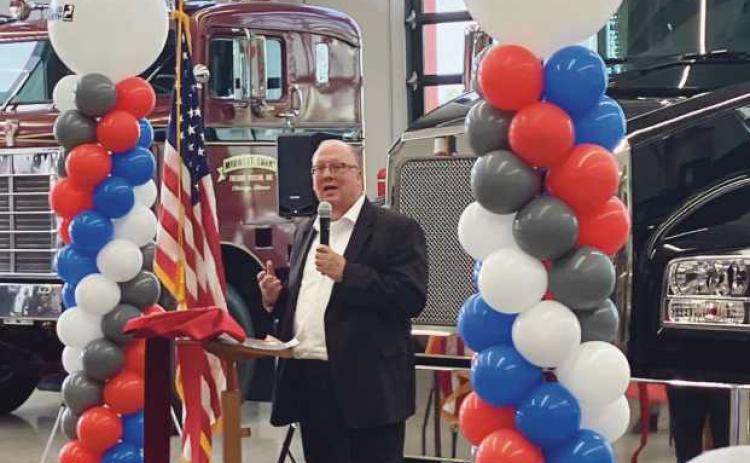 Mayor Neil MacKinnon III spoke during the Whiteford Kenworth ribbon cutting.