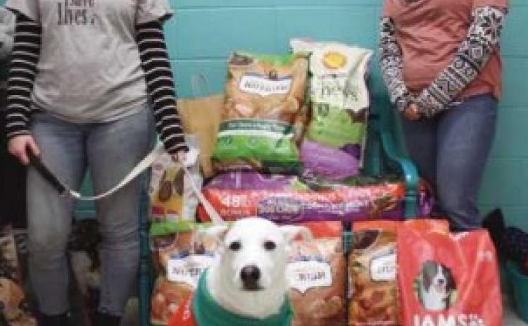 Journal delivers pet food donations to Wood County Humane Society