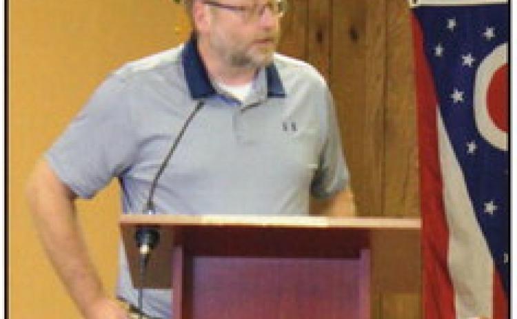 Chris Smalley, Wood County Park District director, addresses the trustees, seeking their support for a grant to purchase property adjacent to Refuting park.