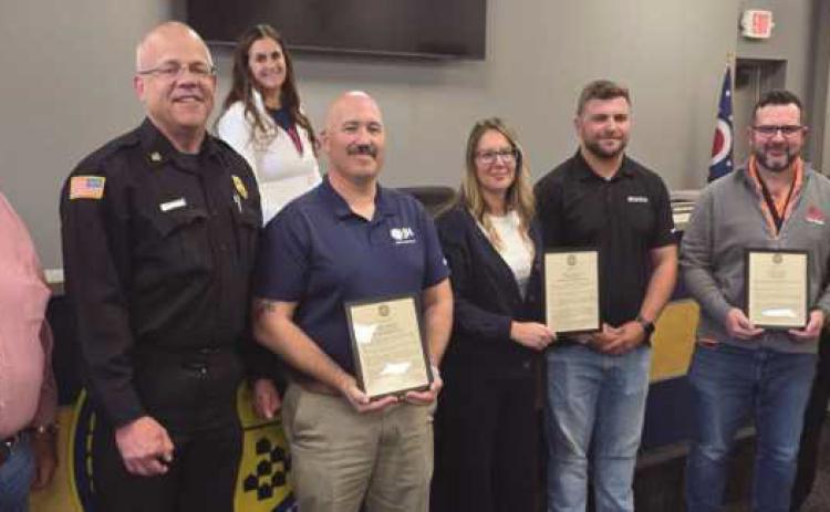 From left: Trustee Joe Schaller, Fire Chief Tom Brice, Fiscal Officer Gretchen Welch, Sam Peras (Jones-Hamilton Co.), Melissa Madson and Bryce Eisel (Cardinal Aggregates), Jason Mesteller (First Solar), Deputy Fire Chief Jim Rodriguez and Trustee Jeff Moore.