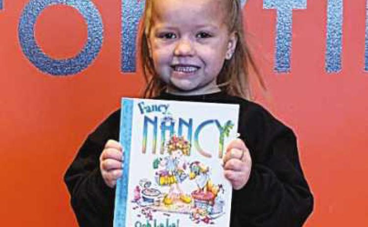 Marley with her new book.