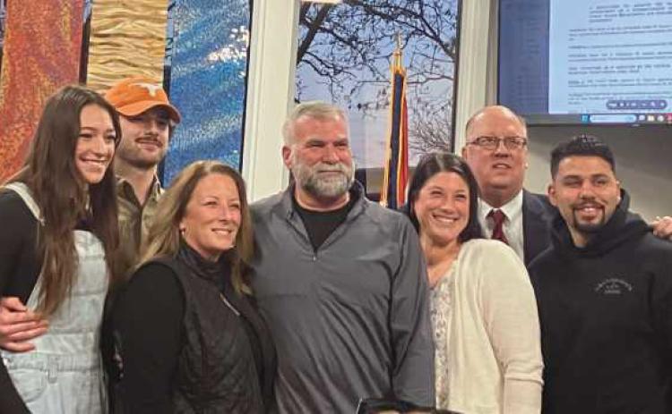 Public Works Superintendent Daryl Igo (center) with his family and Mayor MacKinnon (second from right).