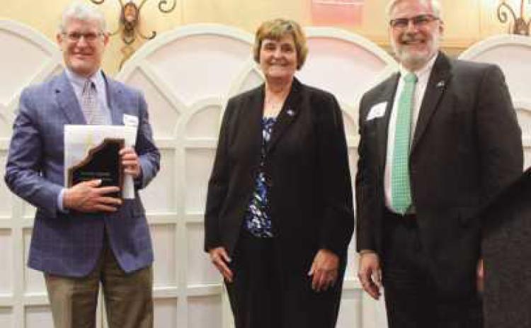 Above is Jerry Greiner, NWSD president, far right, with his staff and board members.