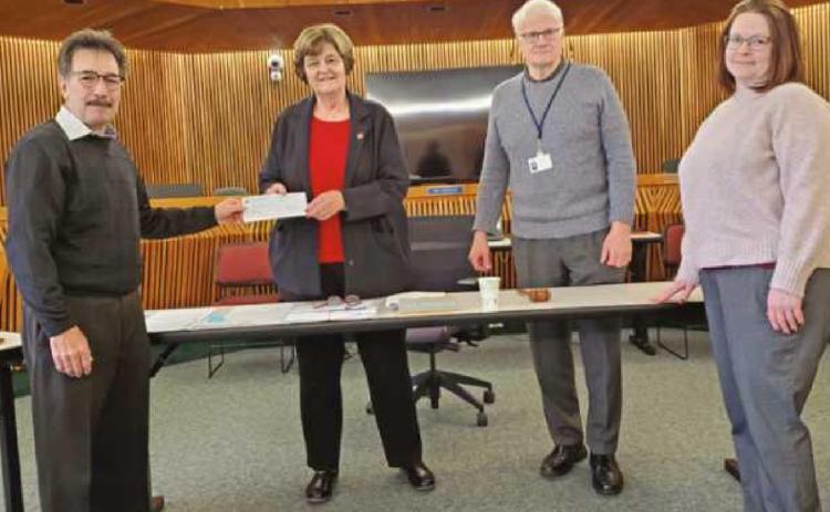 Wood County commissioners present check for Big Fix low-cost spay program