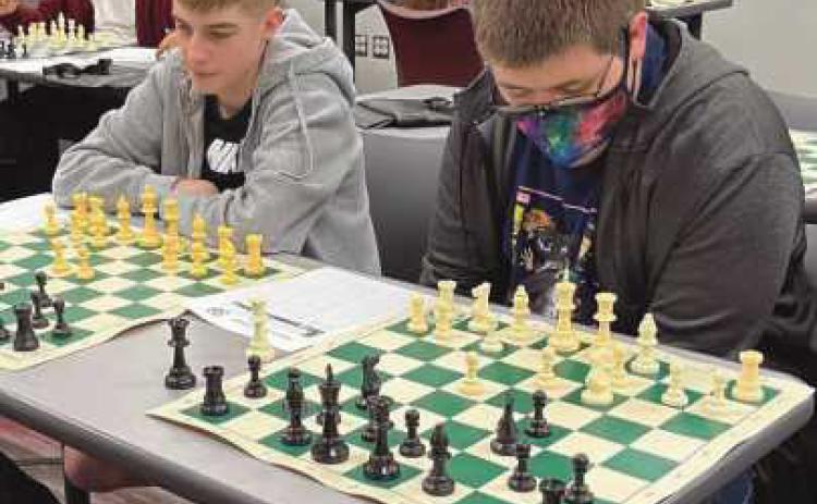 Phoenix Bishop and Dartanian Guerrero plan their next moves during RHS chess team practice.