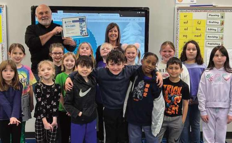 Rossford Elementary second grade teacher Beth Cramer was presented a $500 WATER grant.