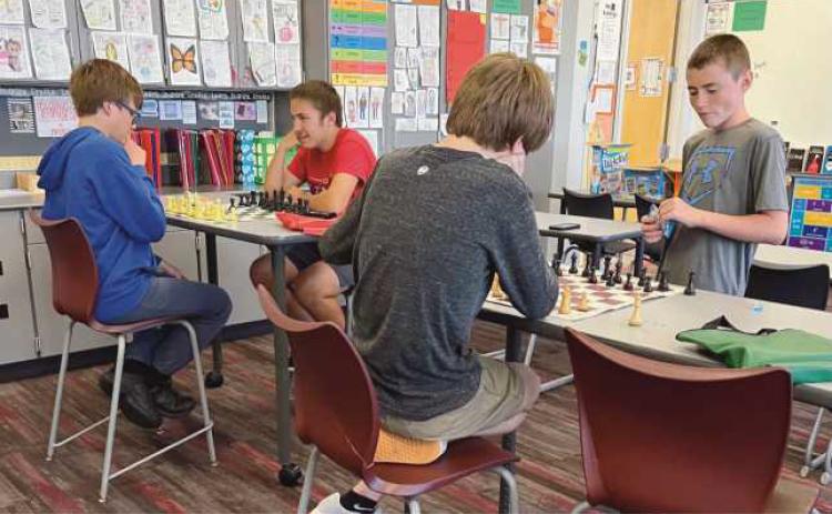 From left, players with faces showing: Nathan Minor and Draven Scott. Players with backs showing: Gabriel Kelsey and Zeke Murtha.