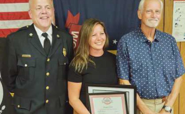 From left: Fire Chief Tom Brice, hero awardee Maggie Sutton and survivor Klaus Zoepke.