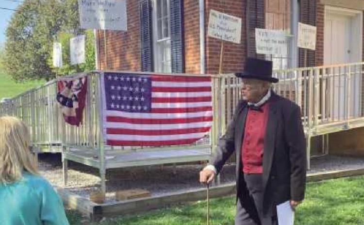 Frank Butwin portraying William Henry Harrison running for U.S. President in 1840.
