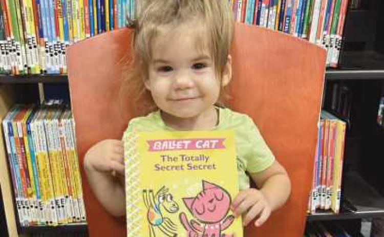 Rossford Public Library welcomes two new members to 1,000 books club