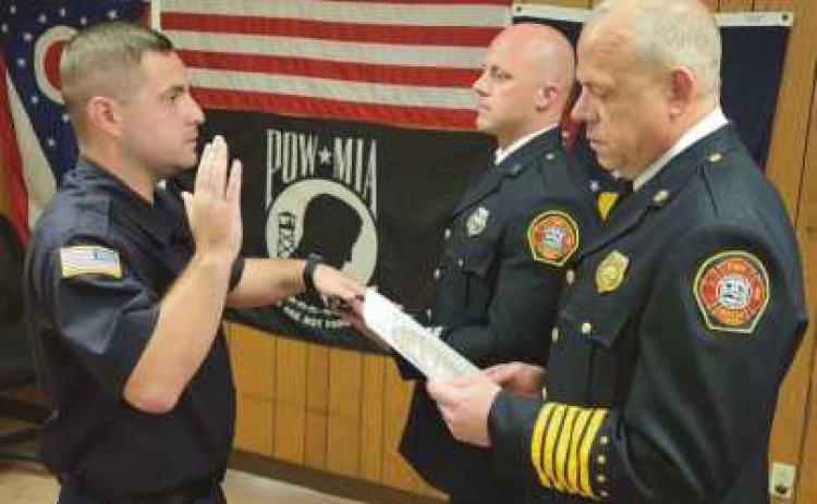 From left: New Firefighter/EMT Drew Lasley, Captain Michael Hampton III and Fire Chief Tom Brice.