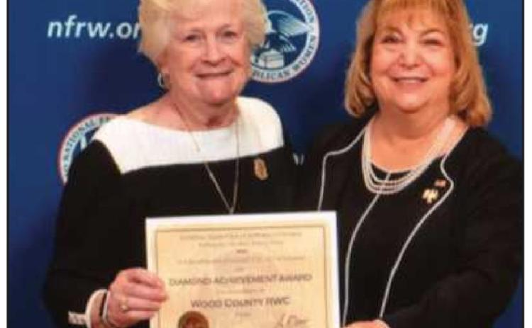 Ann Schockett, right, president of the National Federation of Republican Women, presents Beverly Hirzel with the Diamond Achievement Award for the Wood County Republican Women’s Club.