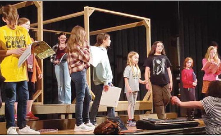 Local children practice for their upcoming performance.