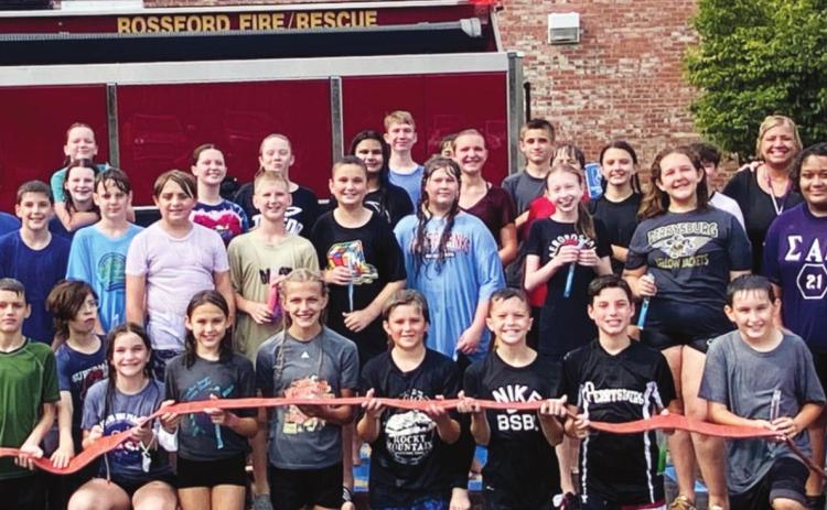 All Saints middle school students enjoy water war