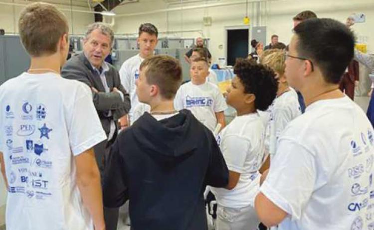 Sen. Brown visits manufacturing camp