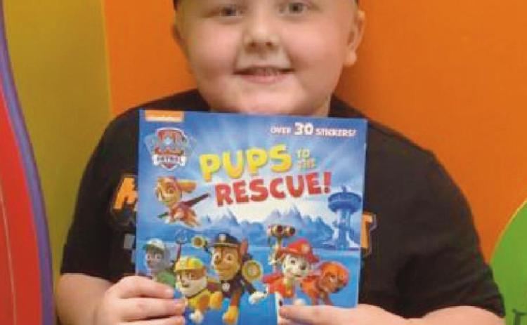 Wyatt Fisher completes 1,000-book challenge