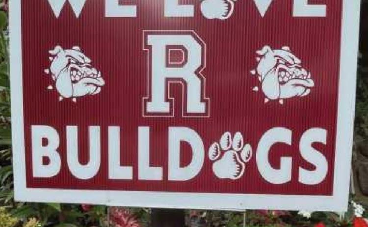 Yard sign sales support RHS cheerleading